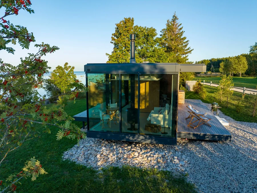 Signature glass house and terrace at Tuultepesa
